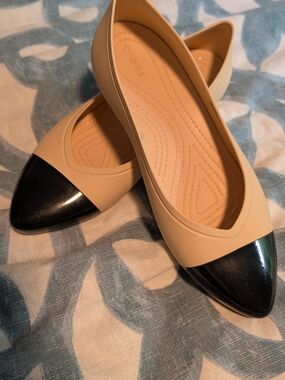 CROCS Two-Tone Pointed Toe Flats in Beige and Black